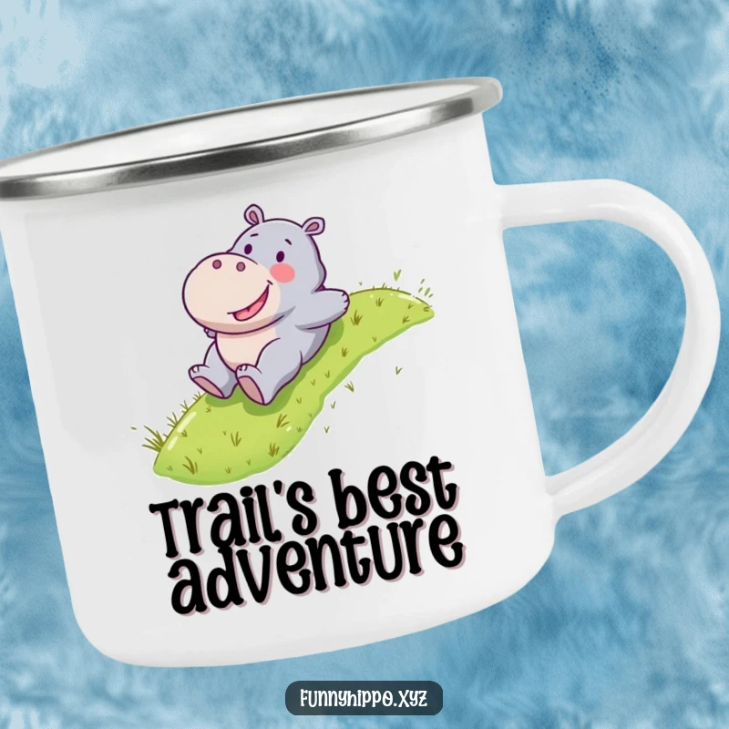 Funny Kawaii hippo happily sliding down a grassy slope, a durable camping mug for outdoor fun.