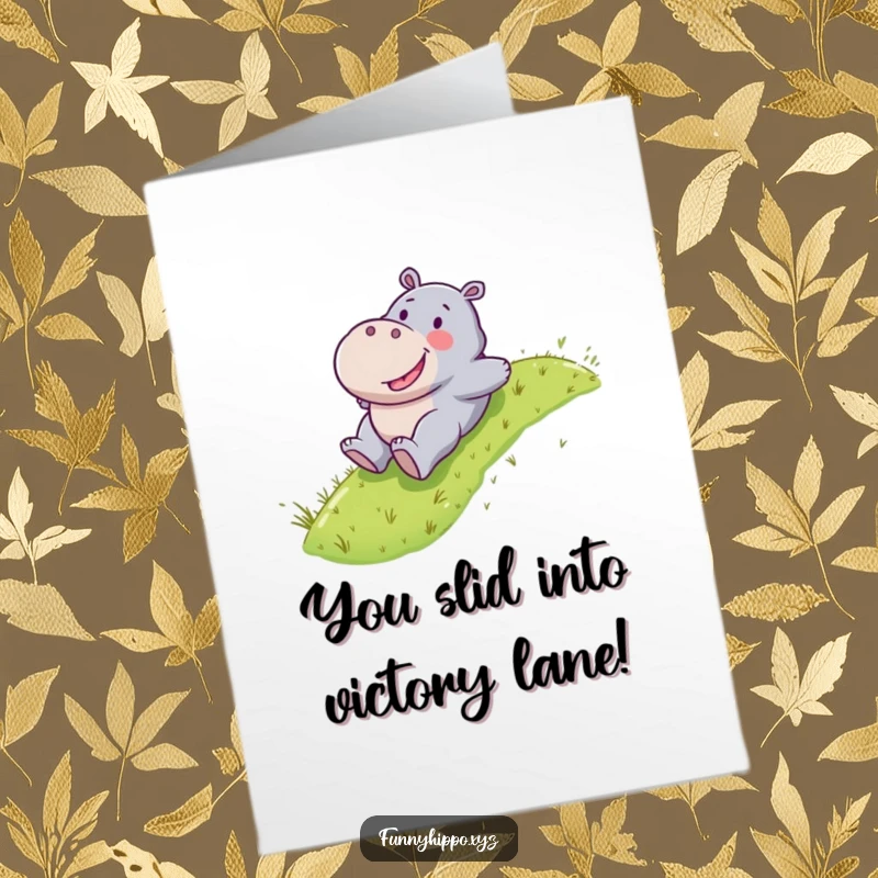 Funny Free Printable Congrats Card: A Kawaii hippo character happily sliding down a green grassy slope.