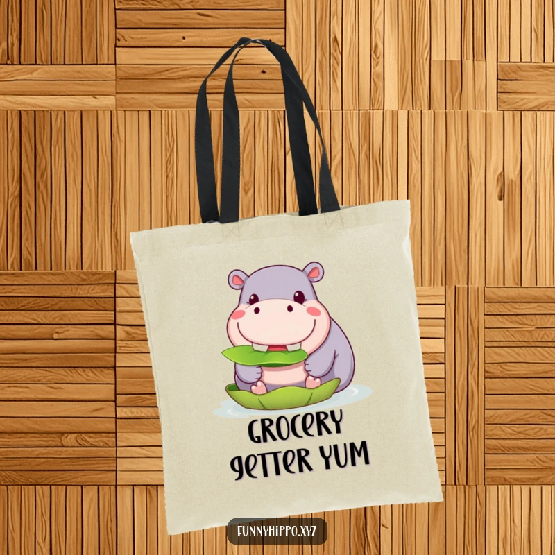 Funny Kawaii Hippo Tote Bag with a cute hippo grinning and munching on a lily pad, a practical and funny accessory.
